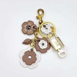 Authentic Louis Vuitton Lock & Key with Unbranded Flower Charm, Keychain